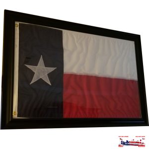 Framed Texas state flag with a single white star on blue