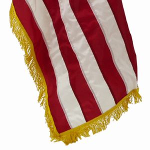 Close-up of a fringed American flag corner.