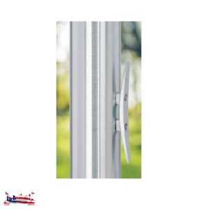Close-up of a window handle on a white frame with a blurred outdoor background.